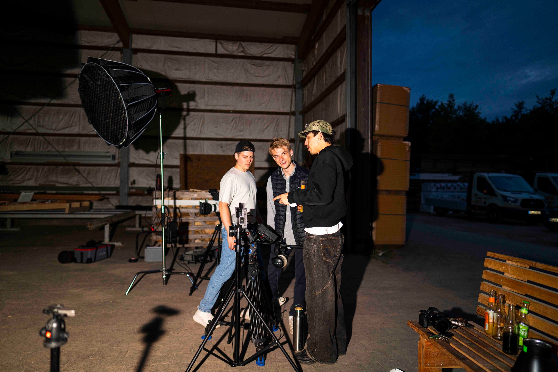BECRE MOTORI crew reviewing the shot on location at dusk